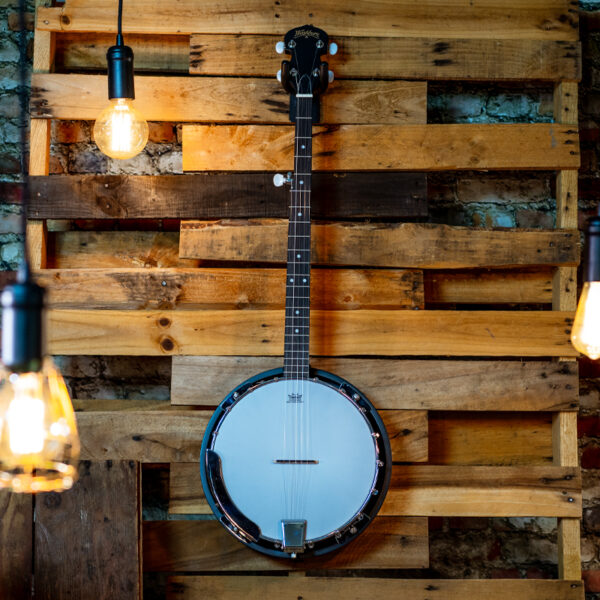 banjo on wood planks