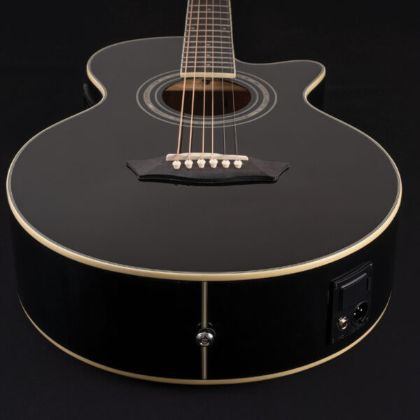 body of black acoustic guitar