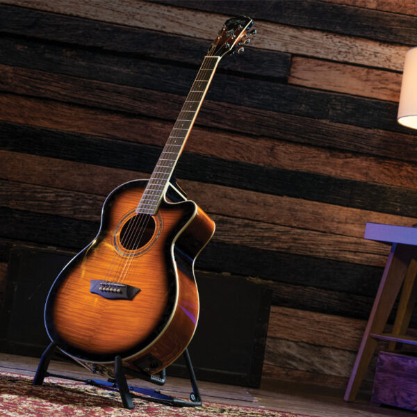 yellow acoustic guitar on stand