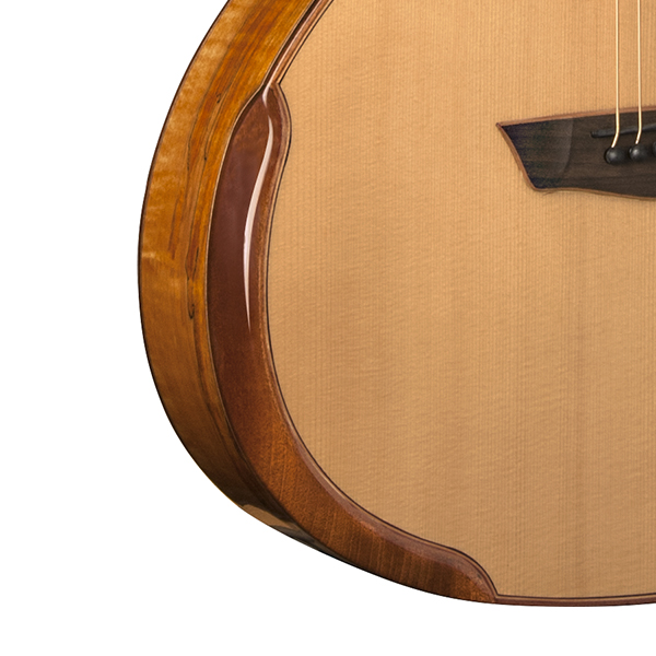 closeup of bevel on body of Washburn acoustic guitar