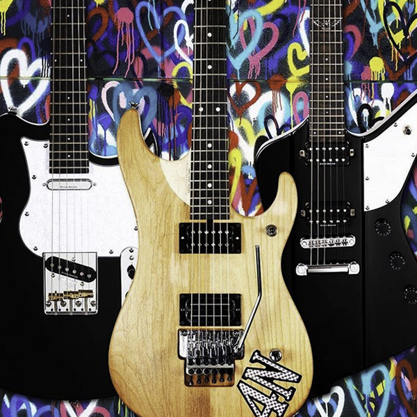 three Washburn electric guitars