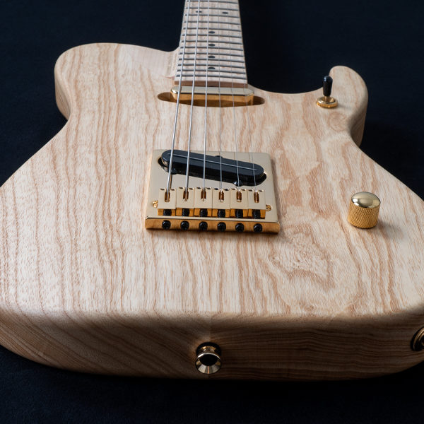 head-on view from bottom of Washburn electric guitar