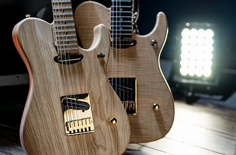 two Washburn electric guitars